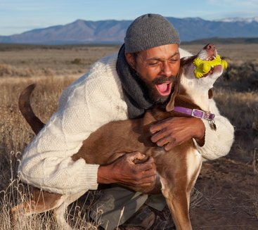 man-play-with-dog